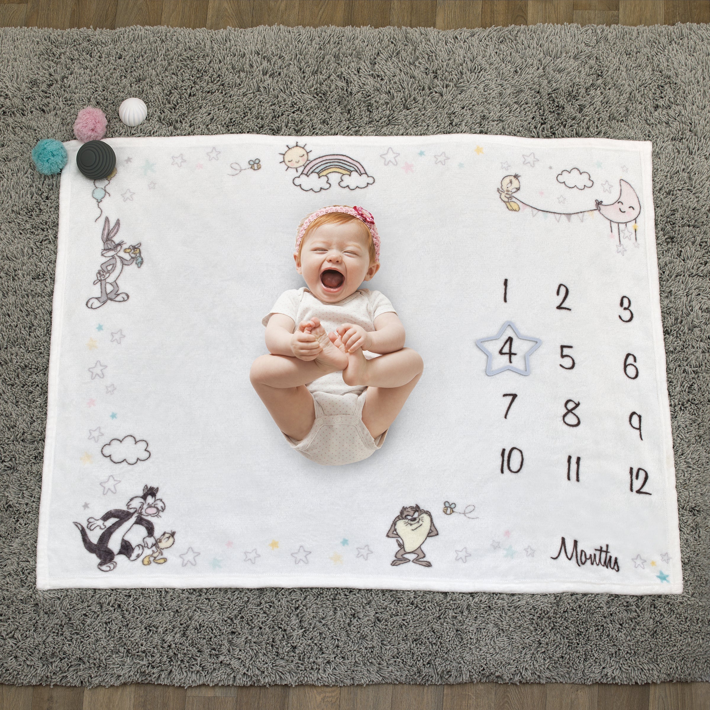 Warner Bros  Looney Tunes Best Buds White with Pastel Blue, Pink, and Yellow Bugs Bunny, Tweety, Tasmanian Devil, and Sylvester the Cat Milestone Blanket