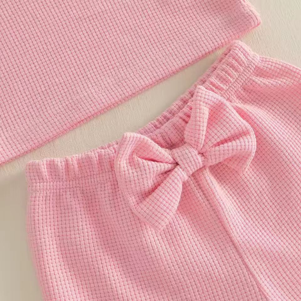 Sleeveless Ruffled-neck Top And Solid-color Bow-trimmed Shorts Set