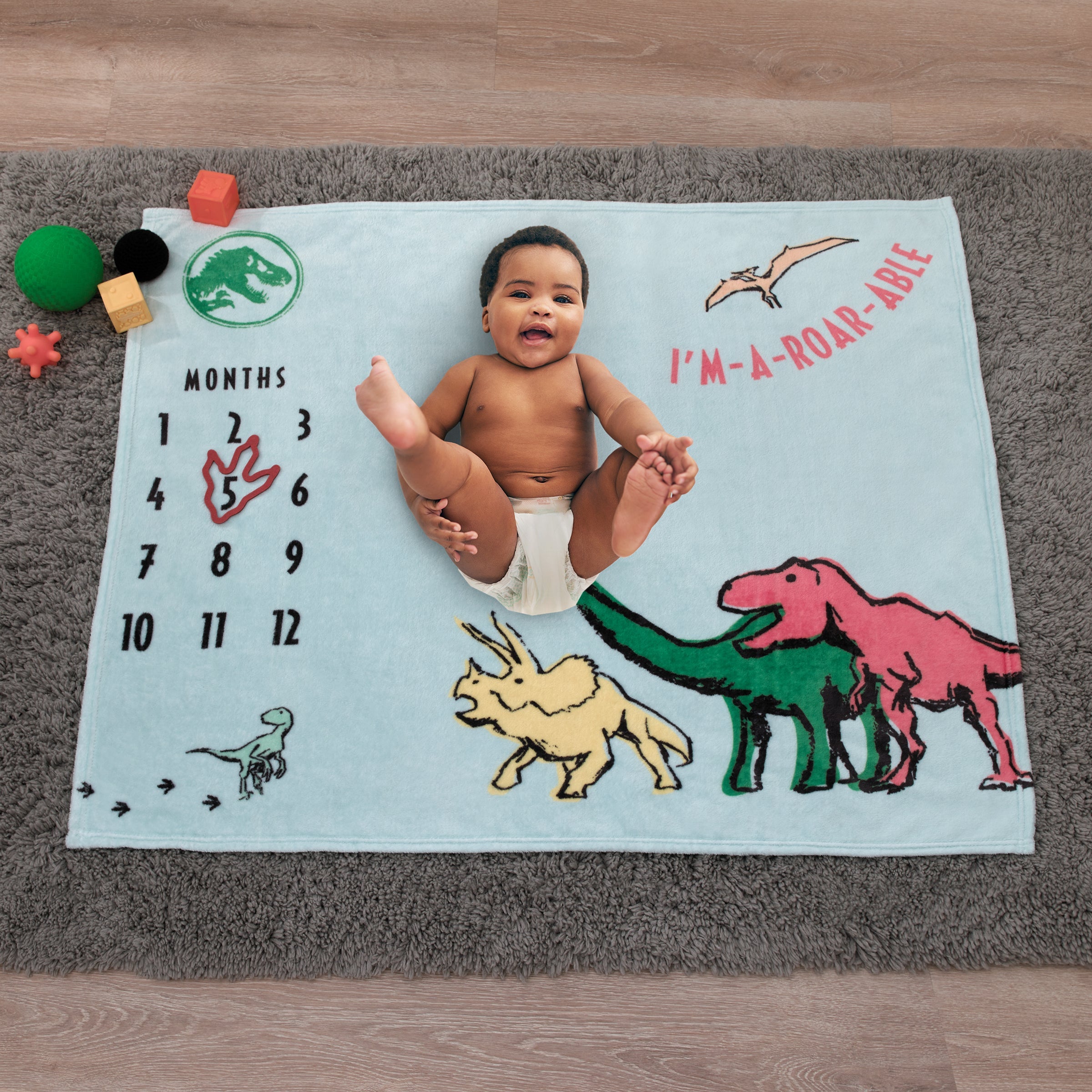 Jurassic World Blue, Green, Orange and Yellow I'm-a-Roar-able Dinosaur Super Soft Milestone Baby Blanket