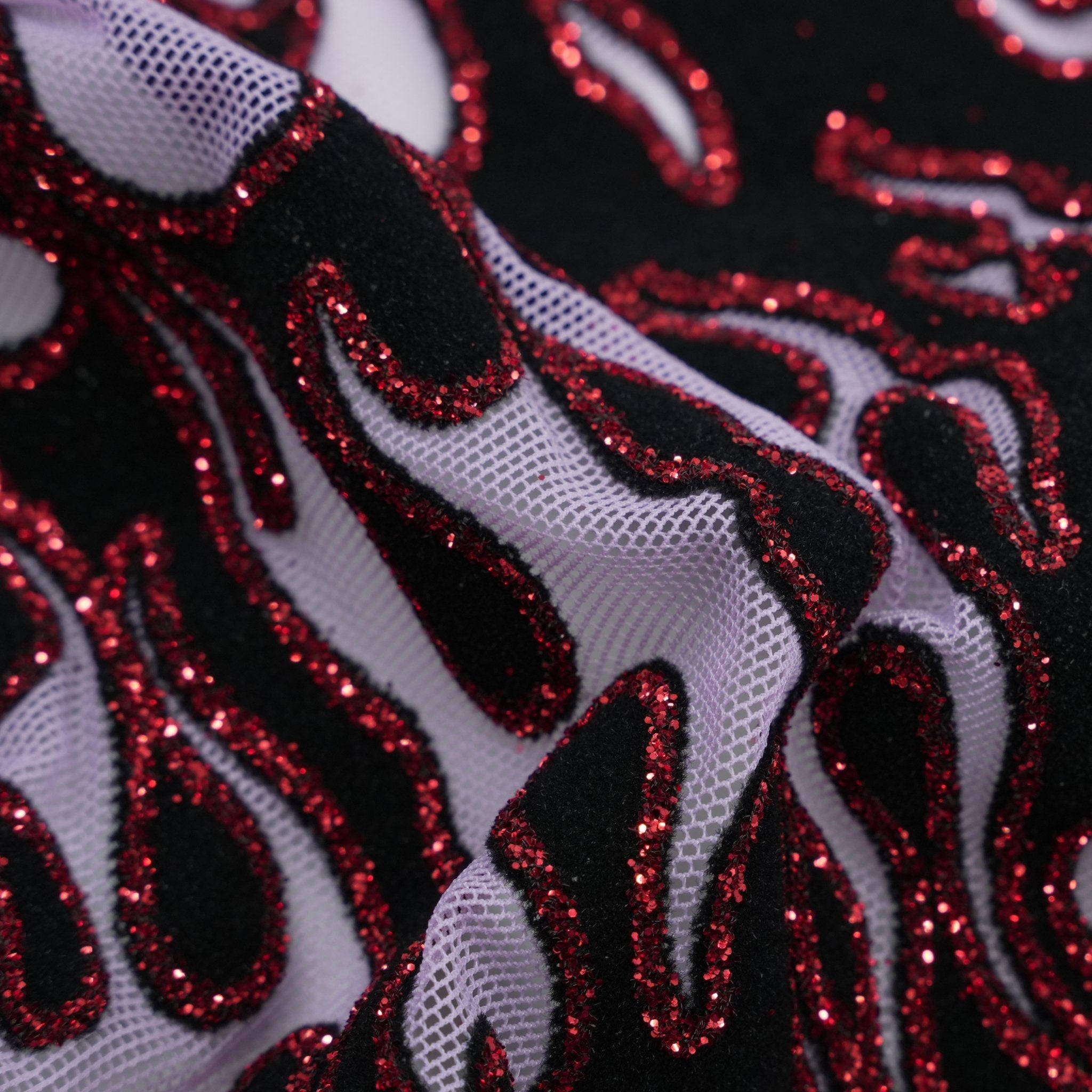 Fiery Glittered Flocked Stretch Mesh Fabric | Blue Moon Fabrics