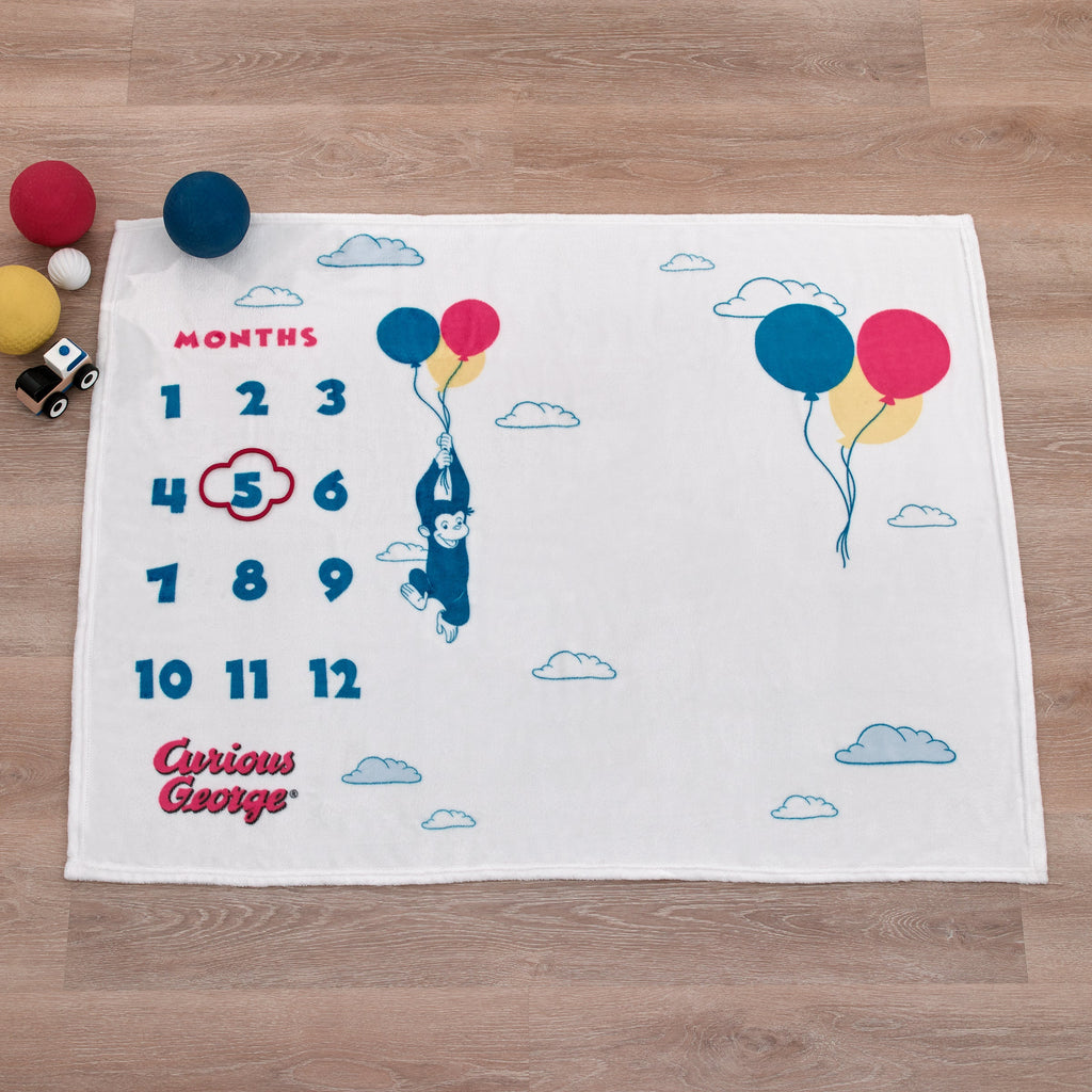 Curious George White, Blue, Red, and Yellow Balloons and Clouds Super Soft Milestone Baby Blanket
