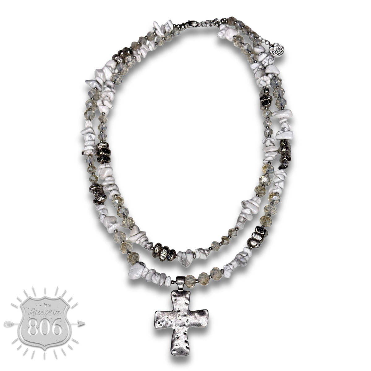 Textured cross pendant on chip stone double strand necklace