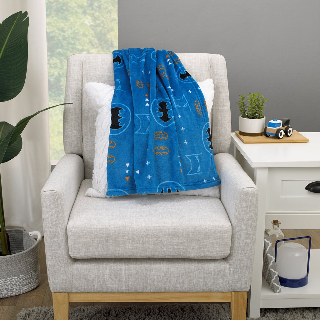 Warner Bros  Batman Blue, Orange, and White with Icons, Emblems, and Triangles Super Soft Baby Blanket