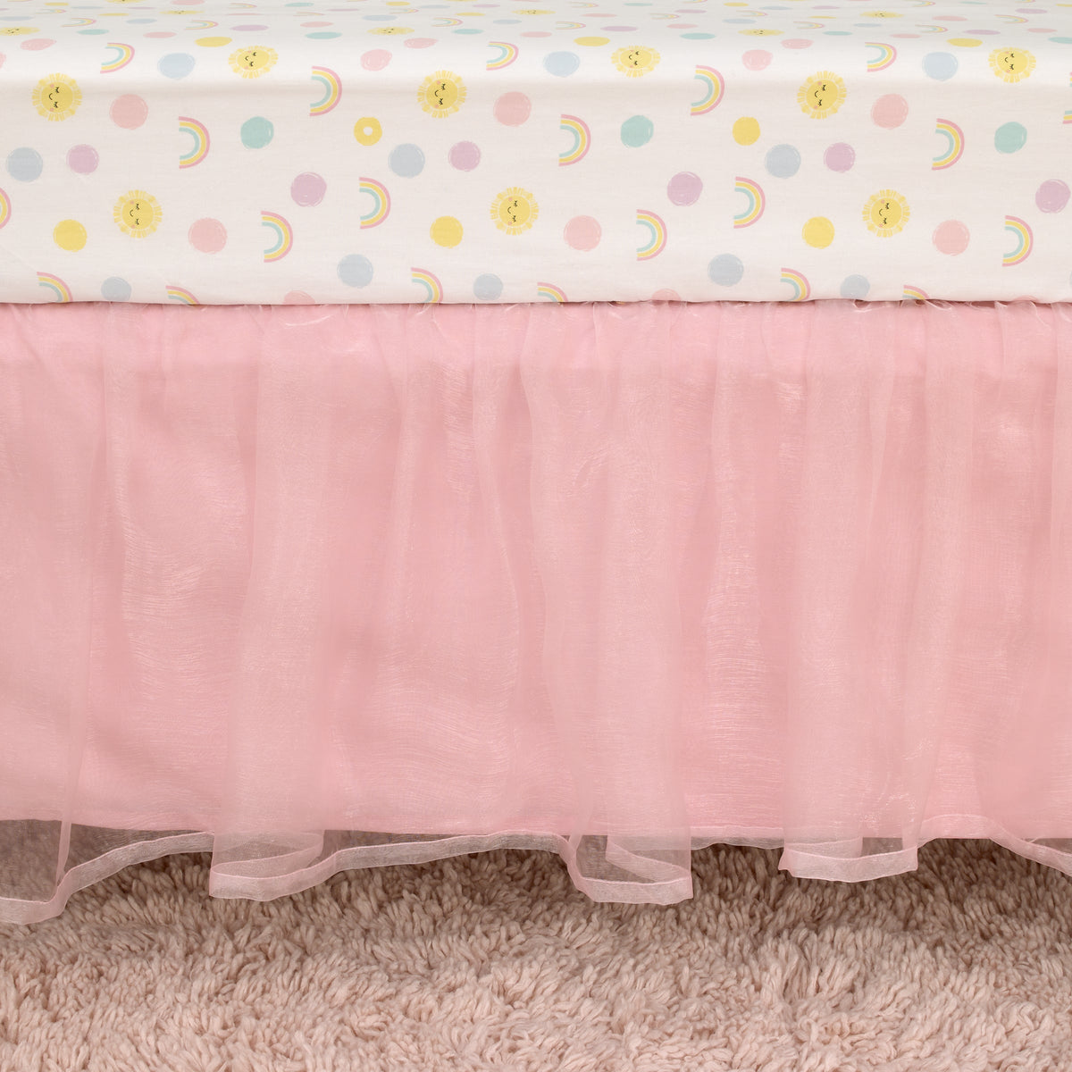 Happy Days Pink, White, and Yellow Rainbows and Sunshine 4 Piece Nursery Crib Bedding Set - Comforter, 100% Cotton Fitted Crib Sheet, Crib Skirt and Reversible Storage