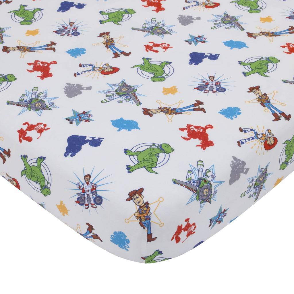 Disney Toy Story 4 - Blue, Green, Yellow Toys in Action 4 Piece Toddler Bed Set - Comforter, Flat Top Sheet, Fitted Bottom Sheet, Reversible Pillowcase