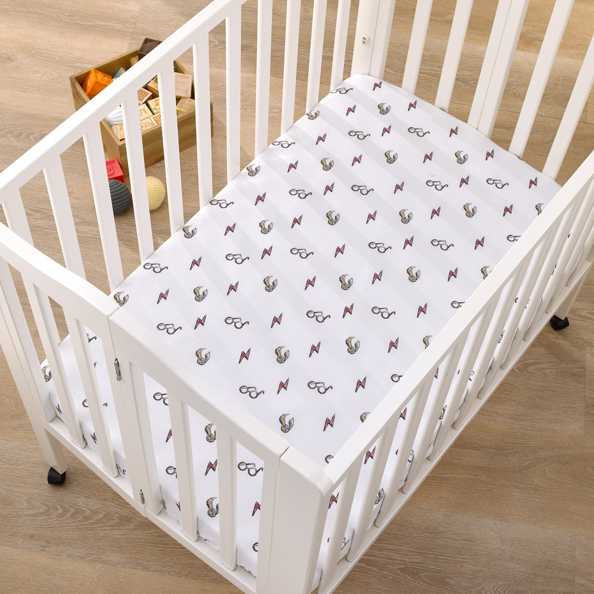 Harry Potter White, Red, and Gold Lightning Bolt, Golden Snitch and Glasses Nursery Fitted Mini Crib Sheet