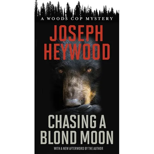 Chasing a Blond Moon: A Woods Cop Mystery - Mass Market Paperbound