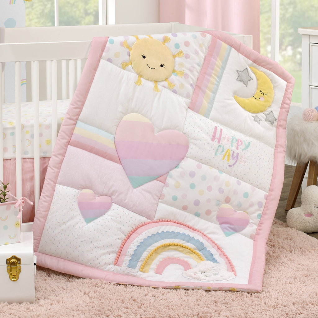 Happy Days Pink, White, and Yellow Rainbows and Sunshine 4 Piece Nursery Crib Bedding Set - Comforter, 100% Cotton Fitted Crib Sheet, Crib Skirt and Reversible Storage