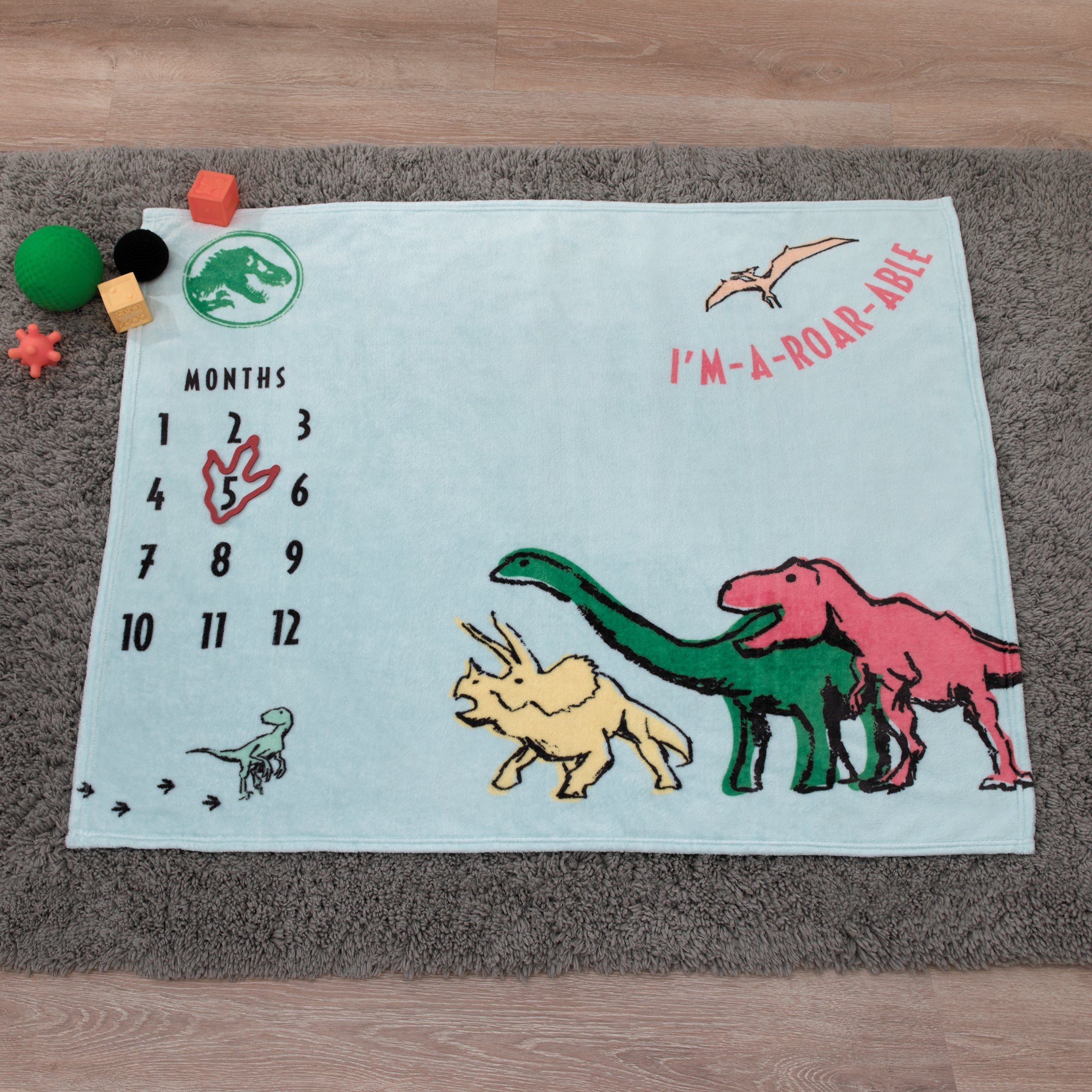 Jurassic World Blue, Green, Orange and Yellow I'm-a-Roar-able Dinosaur Super Soft Milestone Baby Blanket